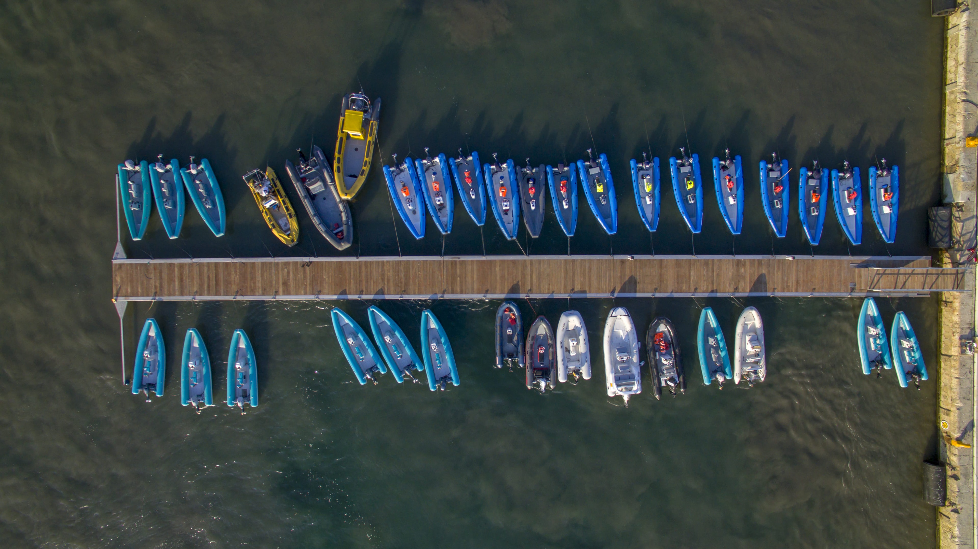 Fleet of motorboats servicing a nautical event